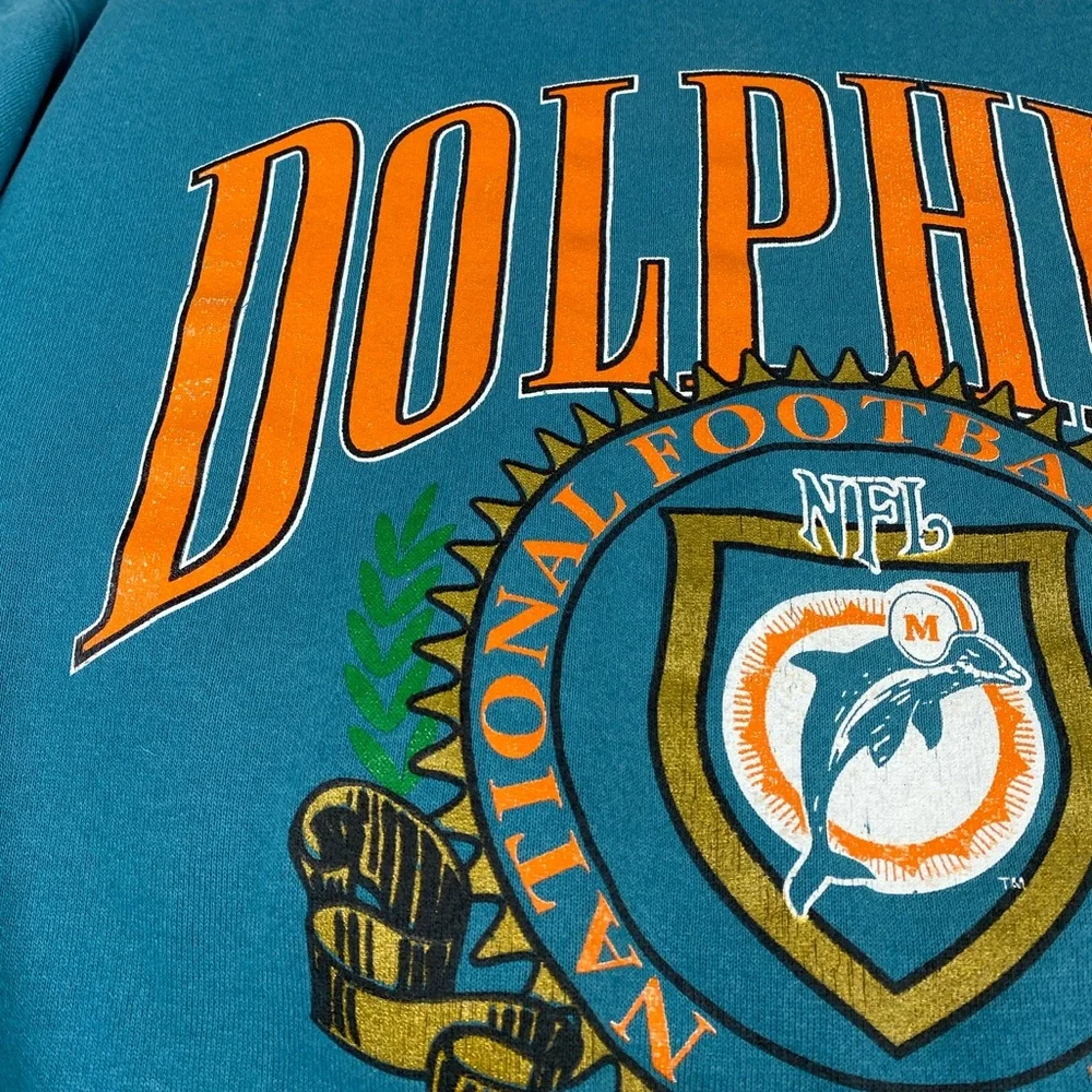 Vintage 1990s Miami Dolphins Nutmeg NFL Turquoise Orange Crewneck Sweater Mens L